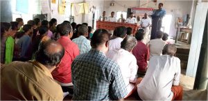 Sub Judge Sri Udayakumar (KELSA) addressing the villagers in an adopted village under SSSVIP in Alappuzha district.